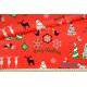 Wzór świąteczny renifery choinki na czerwonym tle - tkanina bawełniana